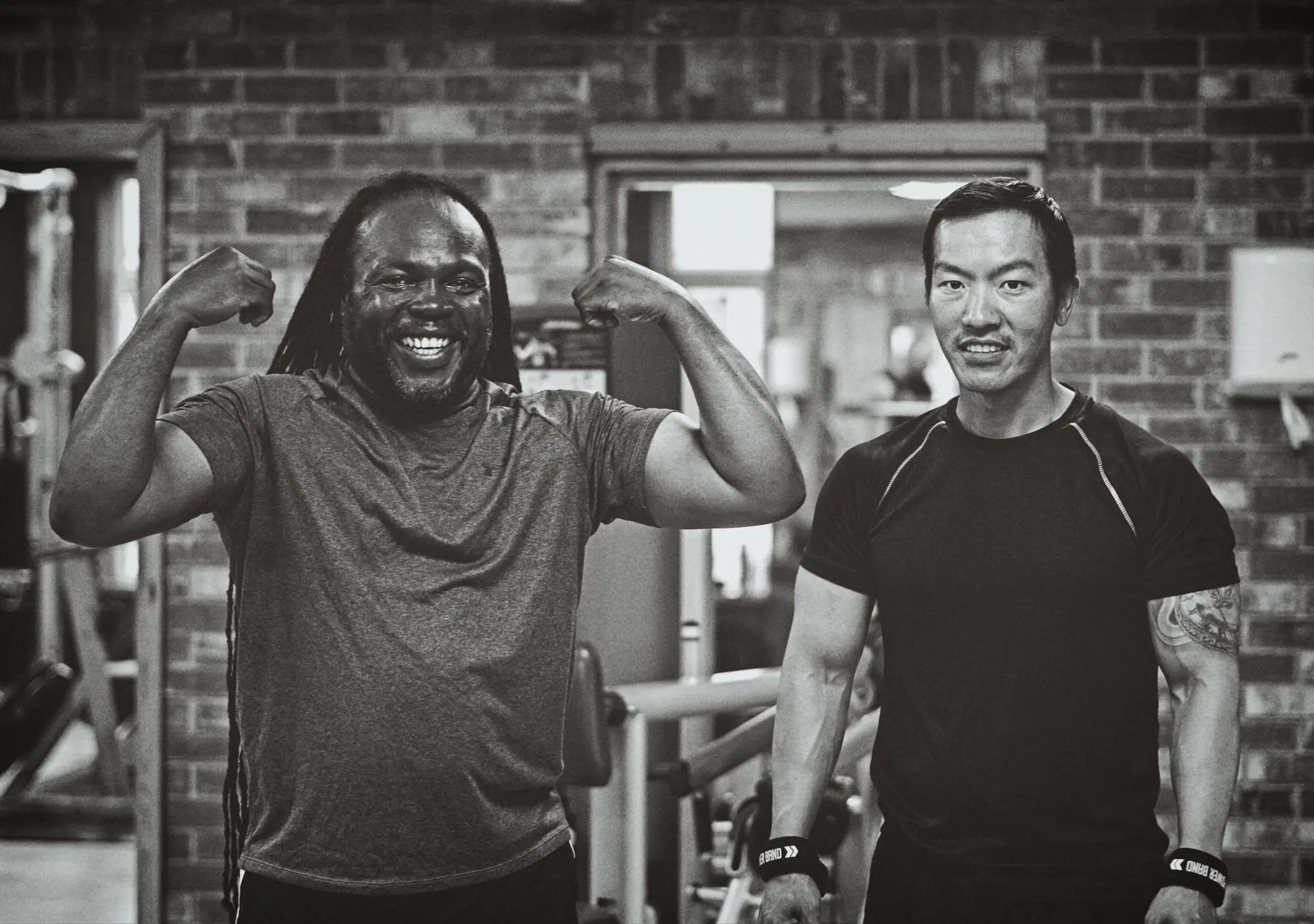 Members smiling on the gym floor