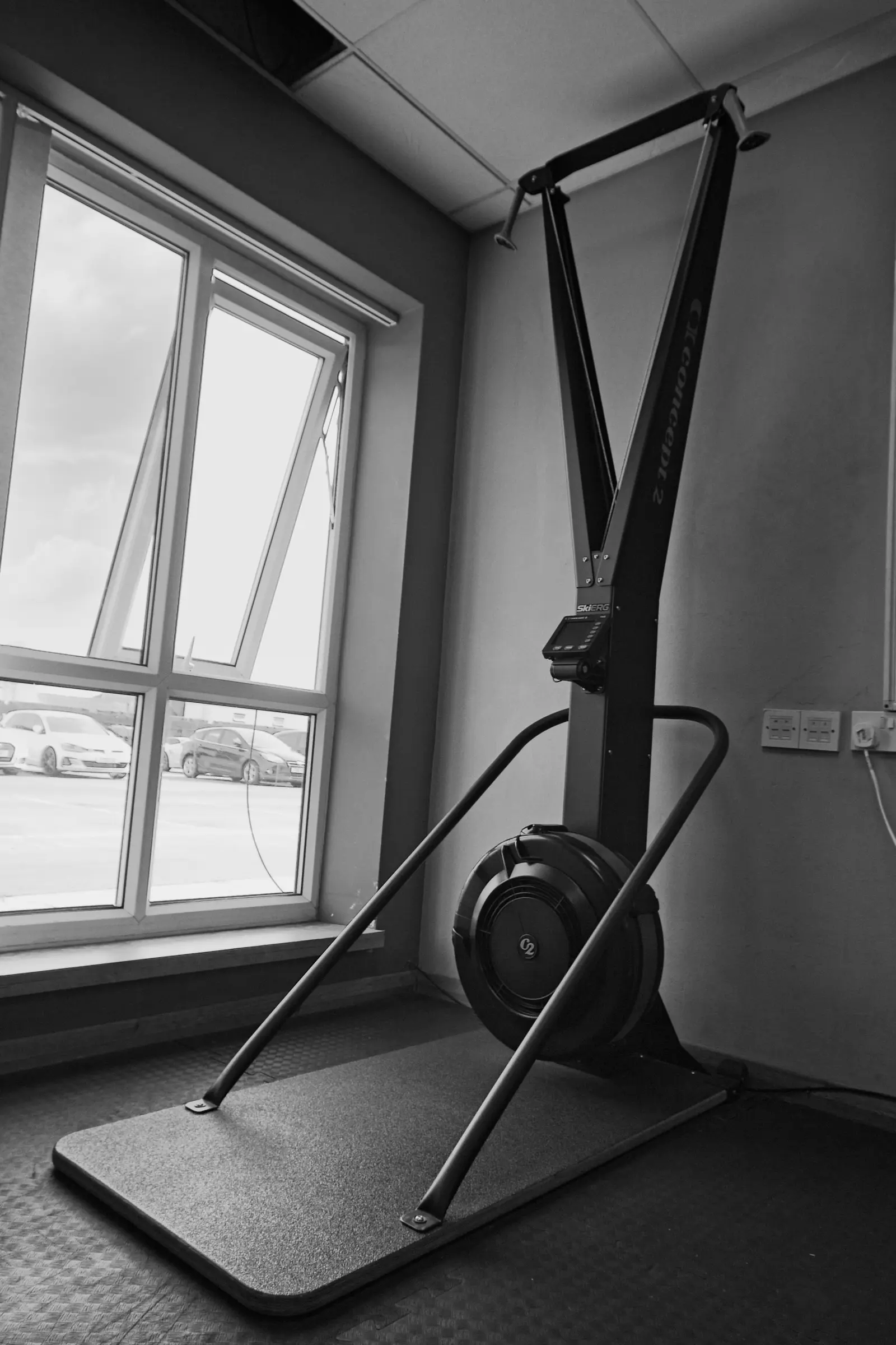 Ski erg machine by the studio window